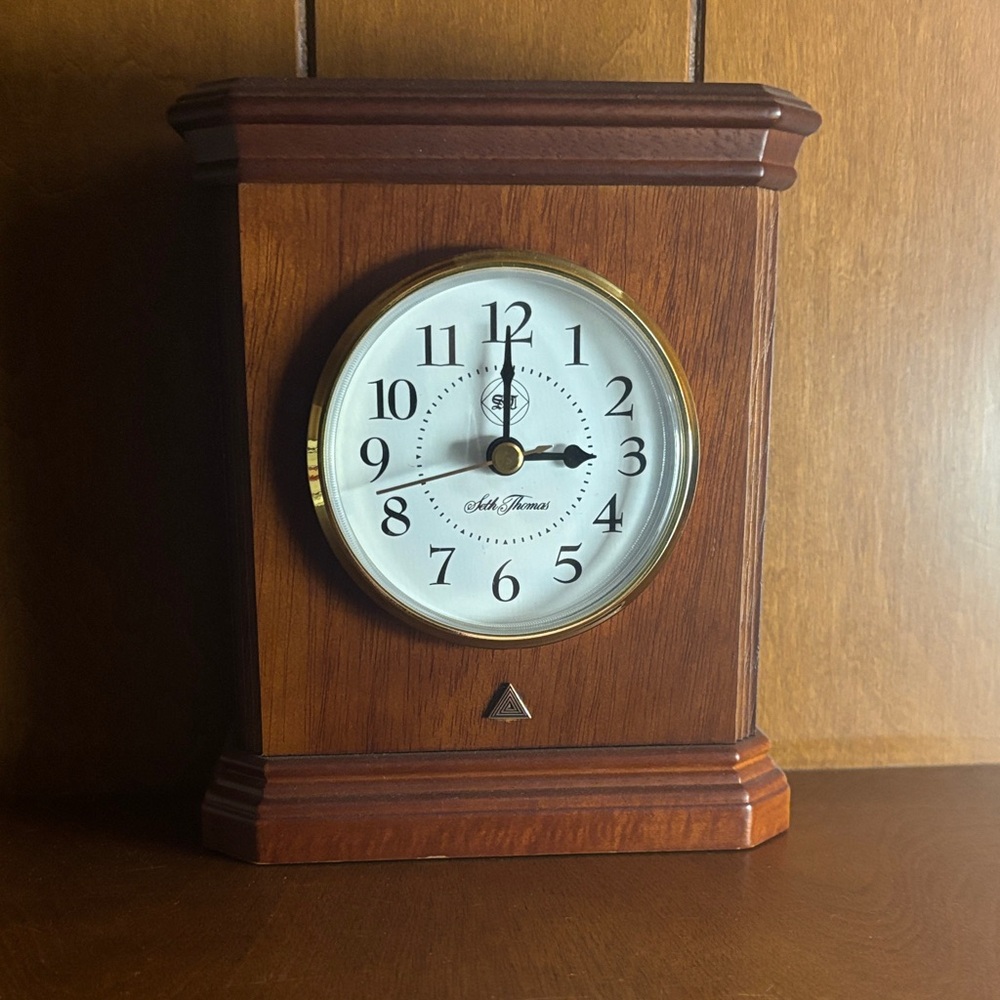 Elegant Wooden Wall Clock with Gold Accents
